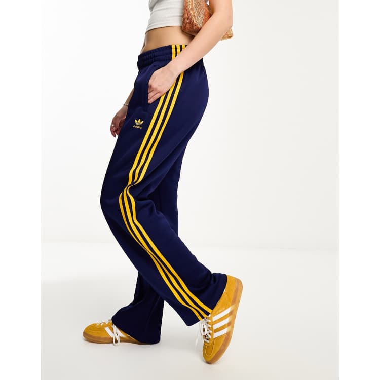 Navy blue and yellow best sale track pants