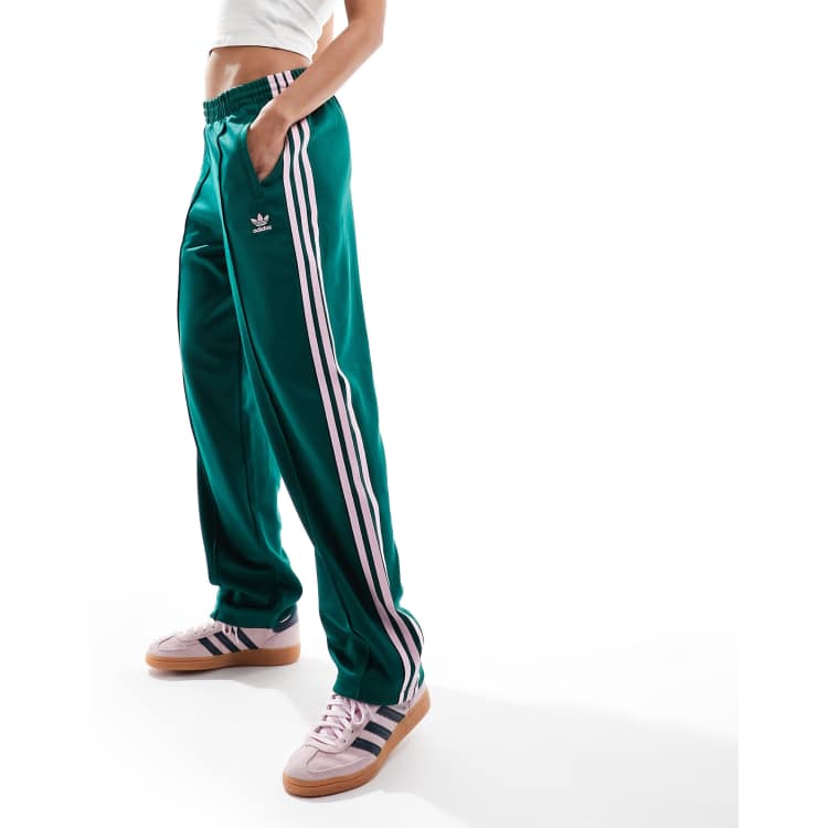 adidas Originals Superstar track pants in green and pink