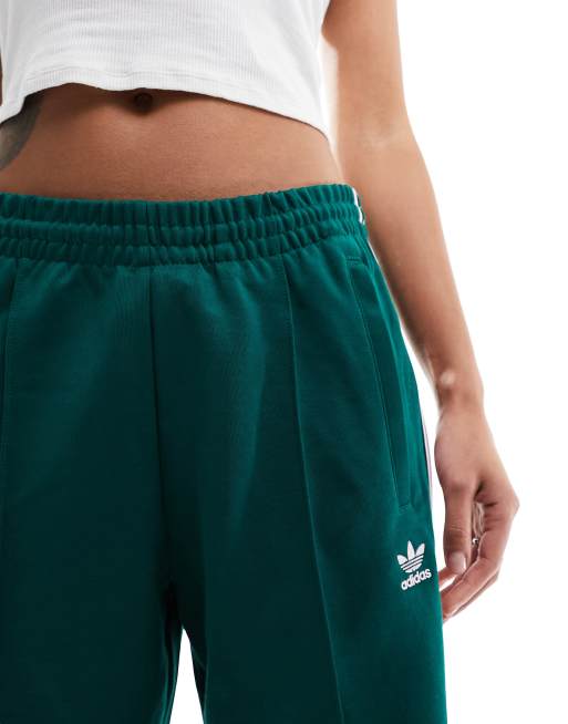 adidas Originals superstar track pants in green and pink