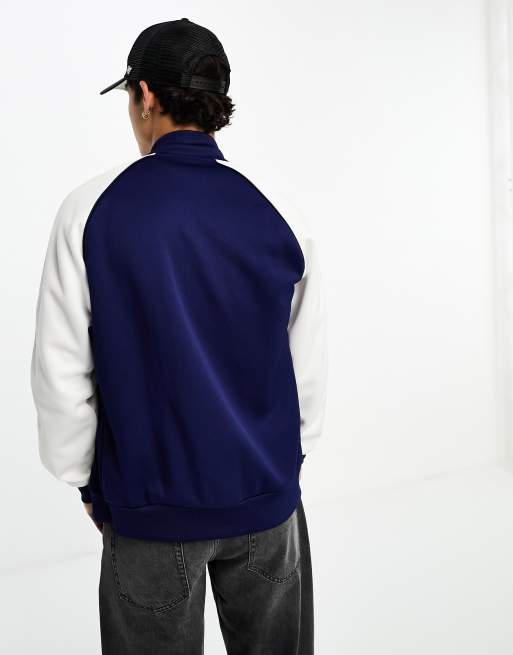 adidas Originals Superstar trackjacket in navy and white