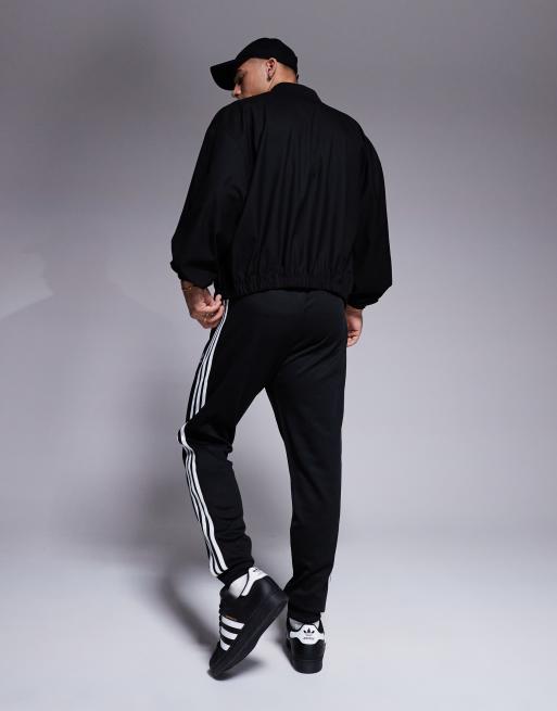adidas Originals Superstar trackpants in black