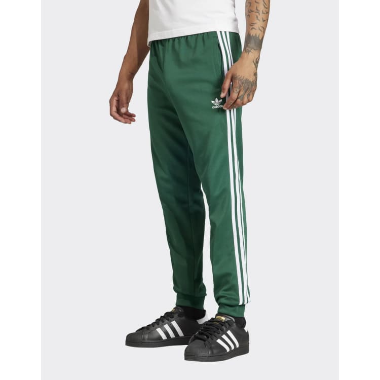 adidas Originals superstar track pant in dark blue, ASOS