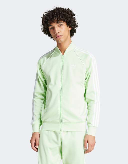 adidas Originals Superstar tracksuit top in light green