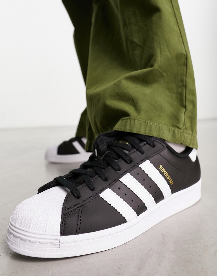 adidas Originals Superstar trainers in black with white stripes
