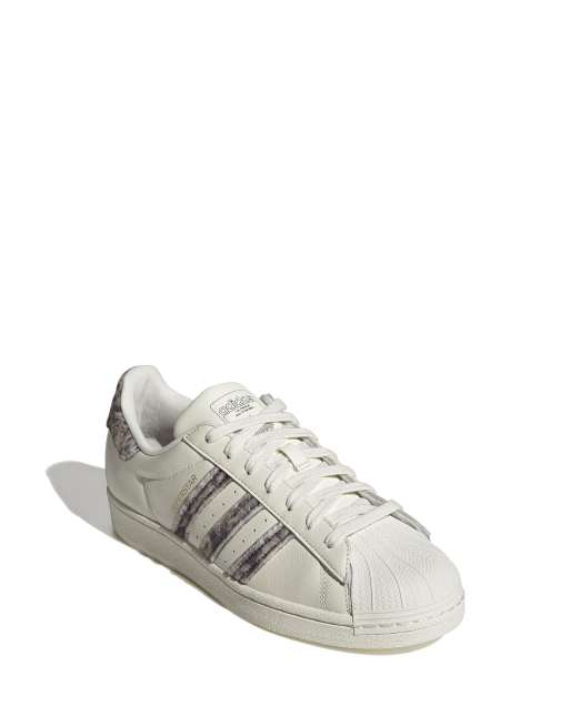 adidas Originals Superstar trainers in off white and brown