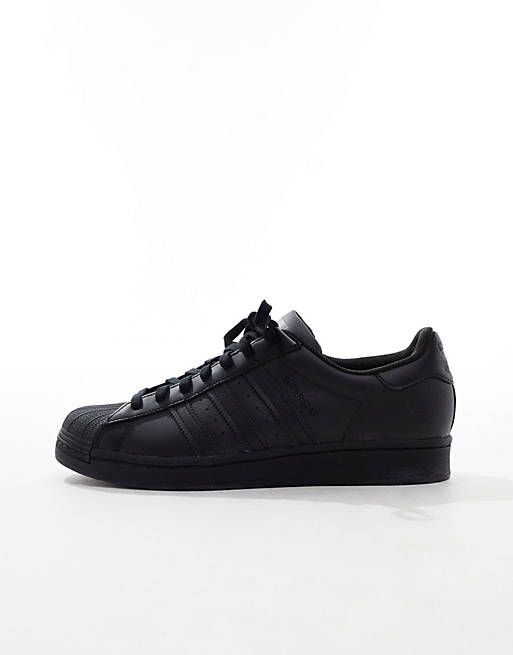 adidas Superstar trainers in black |