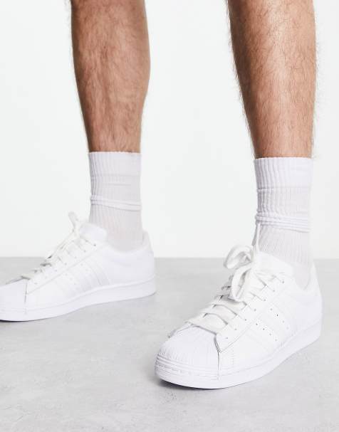 All white outlet superstars on feet