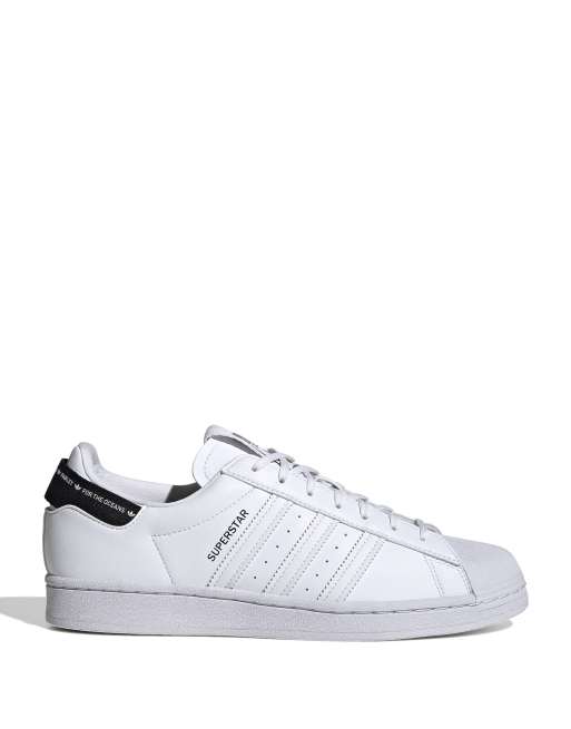 adidas Originals Superstar trainers in white and black