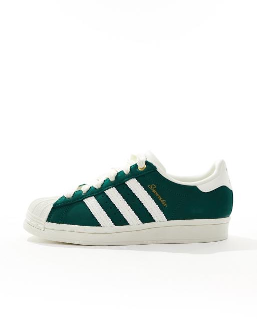 adidas Originals Superstar trainers in white and green