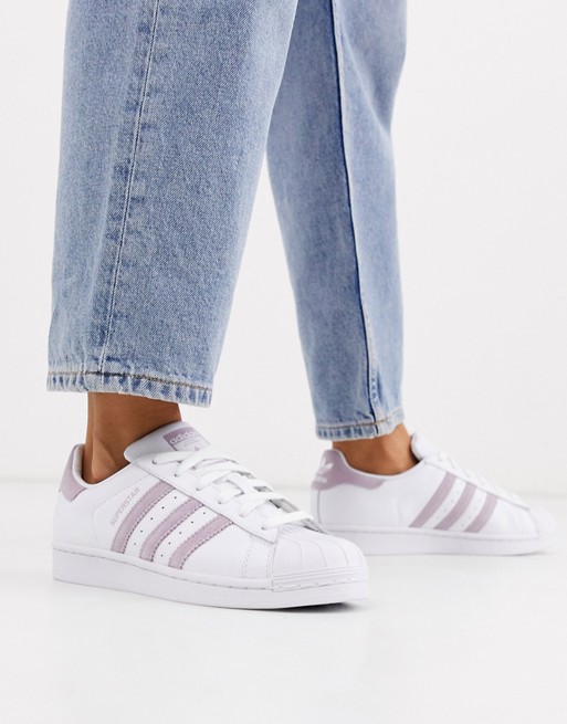 adidas Originals Superstar trainers in white and lilac