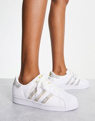 adidas Originals Superstar trainers in white with marble stripes