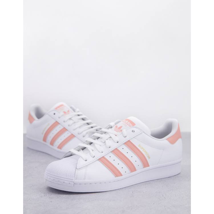 White trainers 2025 with pink stripes