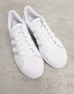 adidas white shoes with silver stripes