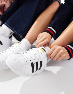 adidas Originals Superstar trainers in white