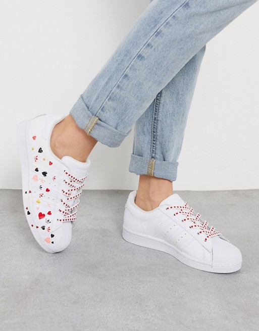 adidas Originals Superstar trainers with heart print in white