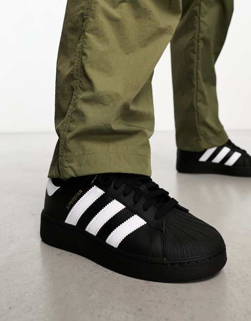 Adidas blanche 2025 rayure noir