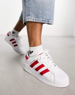 Superstar blanche store bande rouge