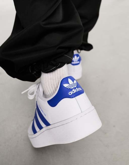 Superstar adidas blue outlet and white