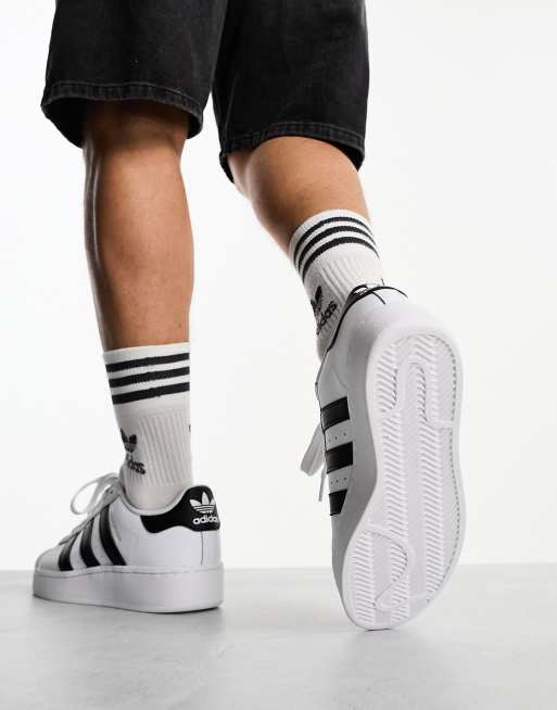 Black and white adidas hotsell superstars outfit