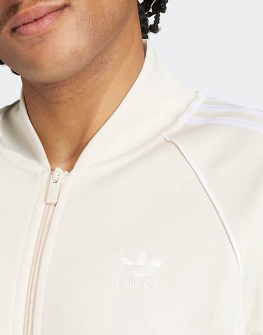 adidas Originals Superstar zip through track top in white adidas Originals Superstar zip through track top in white