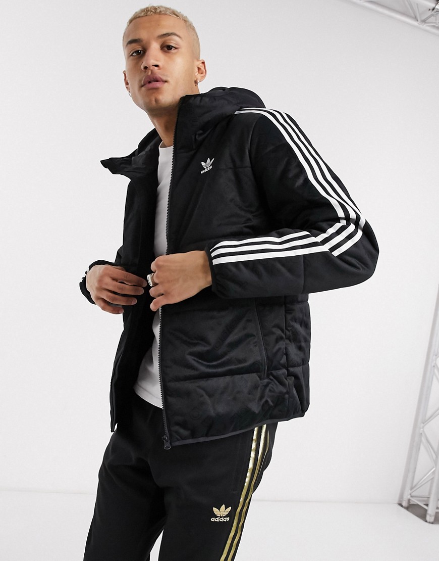Adidas Originals - Svart jacka med vaddering och 3 ränder på ärmarna