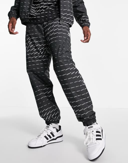 adidas Originals – Svarta mjukisbyxor med upprepad logga