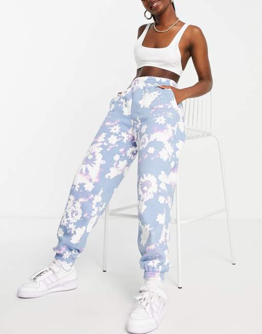 adidas Originals sweatpants in blue with flower print