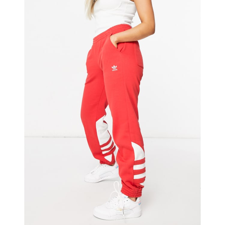 adidas Originals sweatpants in red with oversized trefoil logo