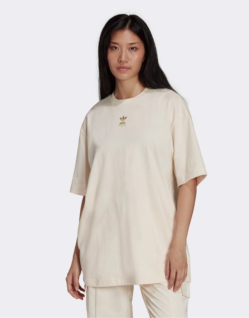 adidas Originals T-shirt in off white with gold logo and back zipper detail