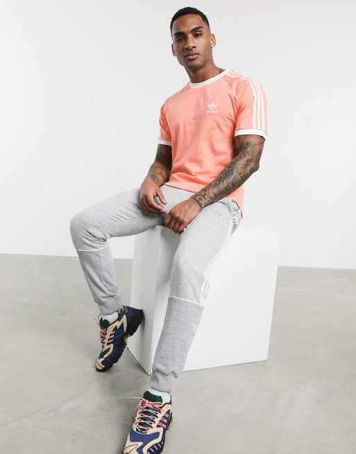 adidas Originals T shirt met drie strepen in roze ASOS