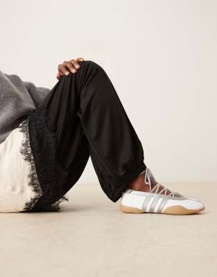 adidas Originals Taekwondo Mei ballet trainers in white and silver with gum sole