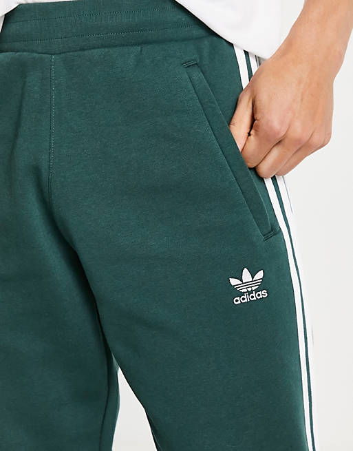 adidas Originals Tall adicolor 3-Stripes sweatpants in mineral green | ASOS