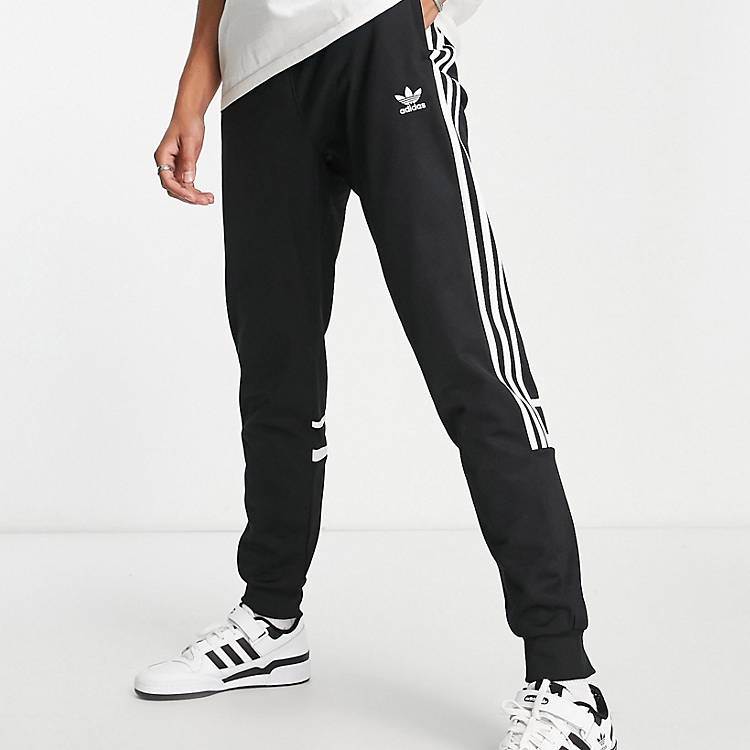adidas Originals Tall adicolor Challenger three stripe slim fit sweatpants  in black | ASOS