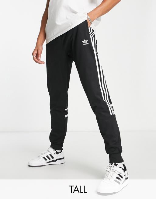 adidas Originals Tall adicolor Challenger three stripe slim fit sweatpants  in black