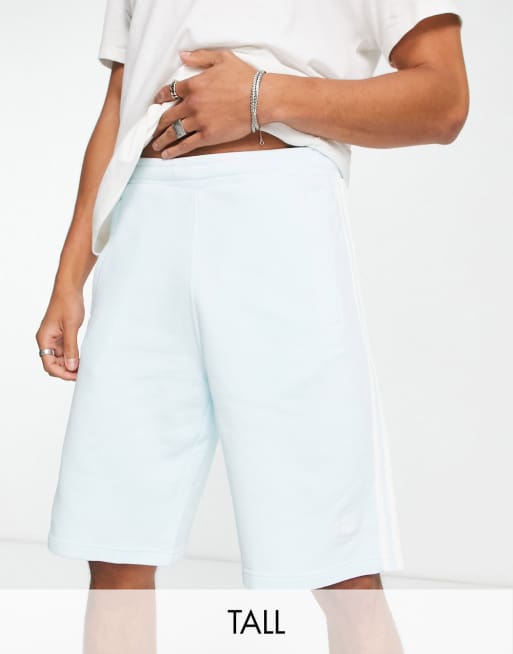 adidas Originals Tall adicolor three stripe shorts in almost blue