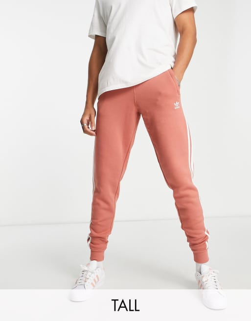 adidas Originals Tall adicolor three stripe sweatpants in magic