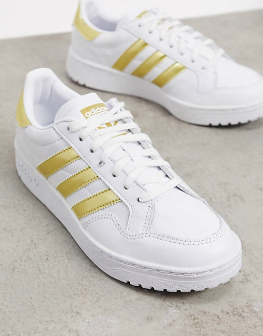 adidas Originals Team Court sneakers in white and gold حبلة