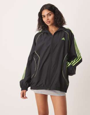 adidas Originals Teamgeist adicolor oversized woven track top in black / signal green