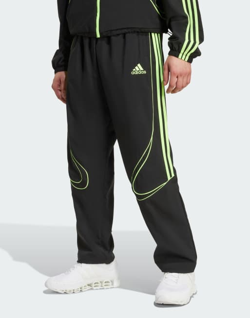 adidas Originals Teamgeist adicolor track pants in black / signal green