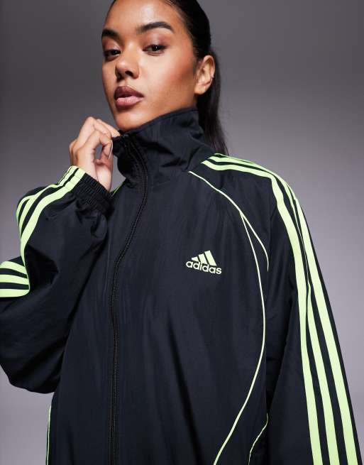 adidas Originals Teamgeist track top in black and bright green