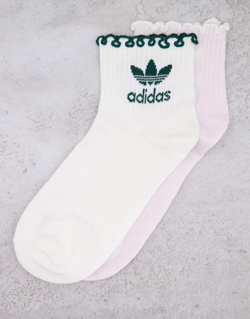 Adidas socks with store logo on front