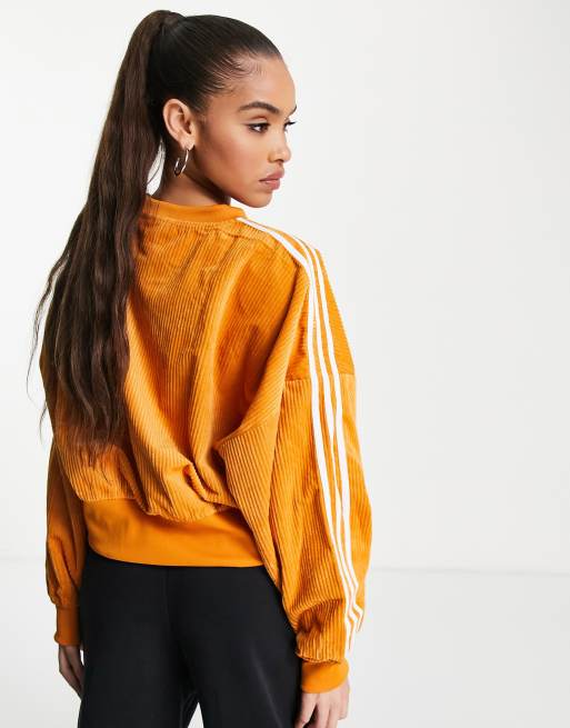 Adidas originals three stripe sweatshirt store in orange