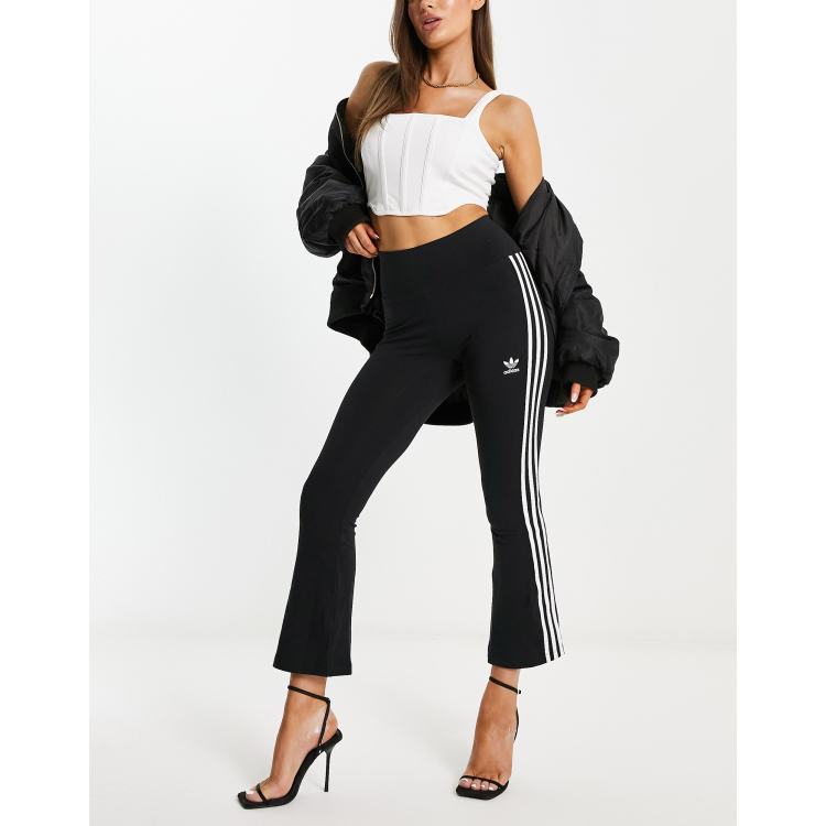 adidas Originals Adicolor Three Stripe Flared Pants In Black, $48