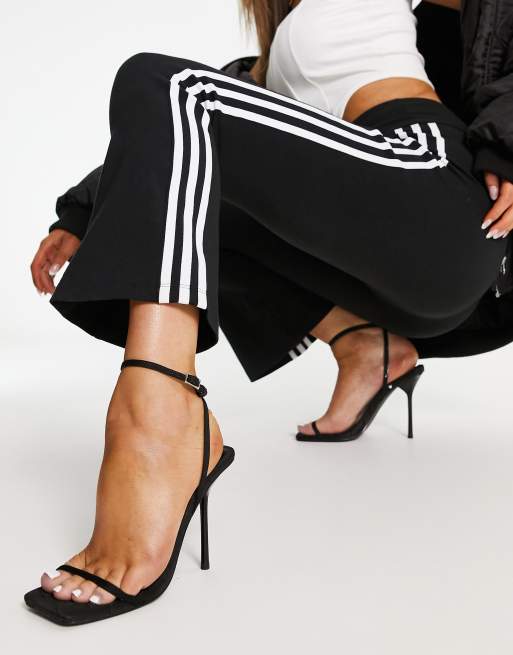 adidas 3-Stripes cropped flare leggings in black - ShopStyle