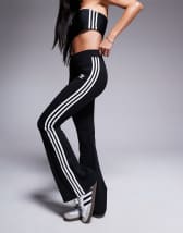 adidas Originals Leopard Luxe flared leggings in black and leopard three  stripe