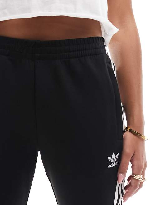 adidas Originals Three Stripe Flared Track Pants In Black