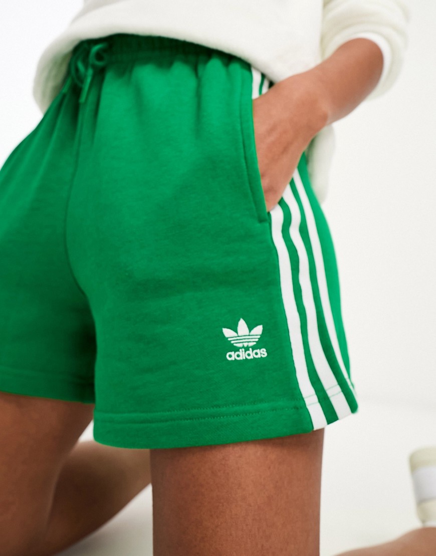 adidas Originals three stripe jersey shorts in green