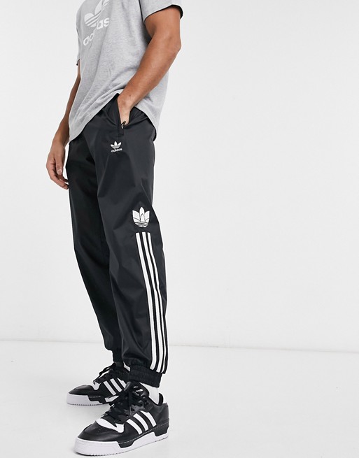 adidas Originals three stripe joggers in black and white | ASOS
