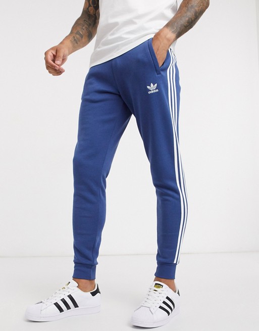 adidas Originals three stripe joggers in blue | ASOS
