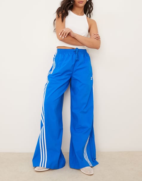 adidas Originals three stripe oversized track pants in blue - view 1